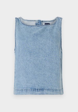 Heledsinine denimpusa, millel on ümmargune kaelus, sirge lõige ja nähtavad õmblused. Minimalistlik disain, ilma täiendavate mustriteta.