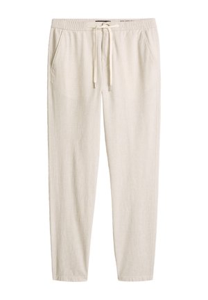 Pantalon beige décontracté avec taille élastique, lien de serrage et poches latérales, en tissu léger.