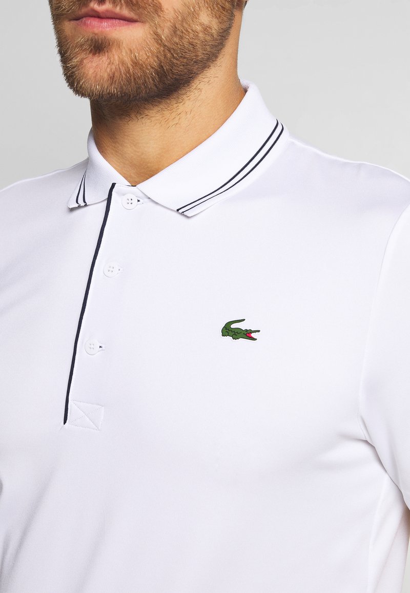Herren Shirts | Lacoste Sport BASIC GOLF Sport T-shirt white/navy blue/weiß - TB96968 Herren Shirts | Lacoste Sport BASIC GOLF Sport T-shirt white/navy blue/weiß - TB96968