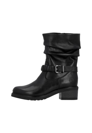 Black leather ankle boot with a slouched shaft, buckle detailing, and a textured heel. Features smooth surface and rounded toe shape.