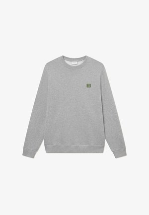 Gray sweatshirt made of cotton blend with long sleeves, ribbed cuffs, and a small green logo on the chest. Soft texture and classic fit.