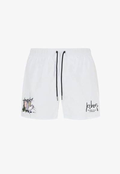 Costumi da bagno bianchi, con cintura elastica e cordino nero, caratterizzati da una grafica colorata di un personaggio dei cartoni animati a sinistra e testo del marchio in nero.