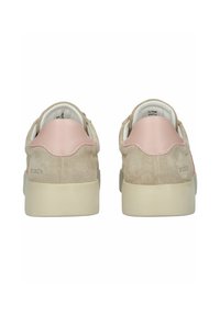 Beige suede sneakers with a pink leather heel accent. Smooth texture, round shape, and a white rubber sole. Brand name displayed on the side.