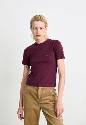 Burgundy short-sleeve fitted t-shirt with a ribbed texture and a small logo on the chest, paired with corduroy tan pants.