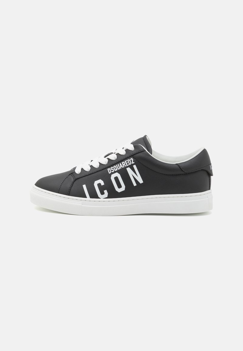 Black sneaker made of synthetic material with white laces, featuring large text "ICON" and brand name on the side, white rubber sole.