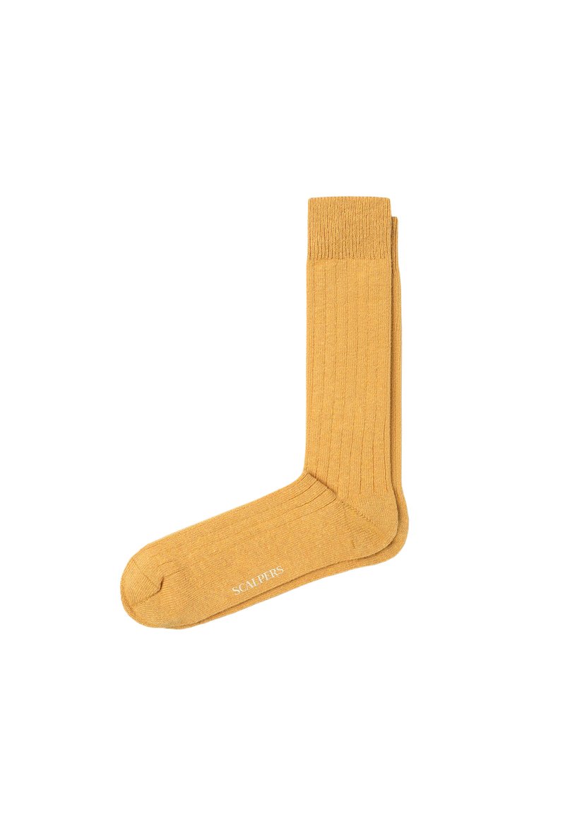 Calzino giallo a coste con punta e tallone rinforzati. Presenta una sottile etichettatura alla base. Realizzato in un materiale morbido ed elastico.