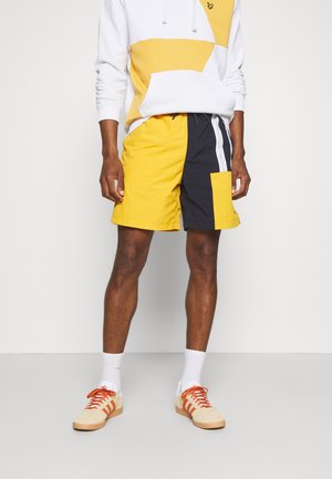 Pantalones deportivos - yellow