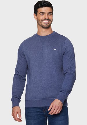 Blå sweatshirt med round neck og lange ærmer, lavet af blødt stof. Har et lille logo på brystet og ribbede manchetter og kant.
