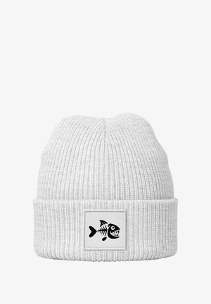 White ribbed beanie with a folded cuff, featuring a black fish skeleton graphic on a white patch. Soft texture, close-knit design.