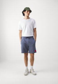 HUGO DIZ - Pantaloni de trening - open blue