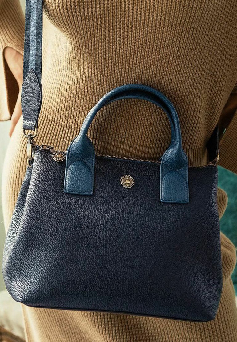 Navy leather handbag with two top handles, a detachable strap, and a textured finish. Features gold-tone hardware and a logo accent.