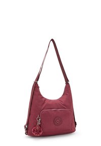 Maroon Kipling axelväska med framficka med dragkedja och apnyckelring, justerbar rem och rundad dragkedjestängning.