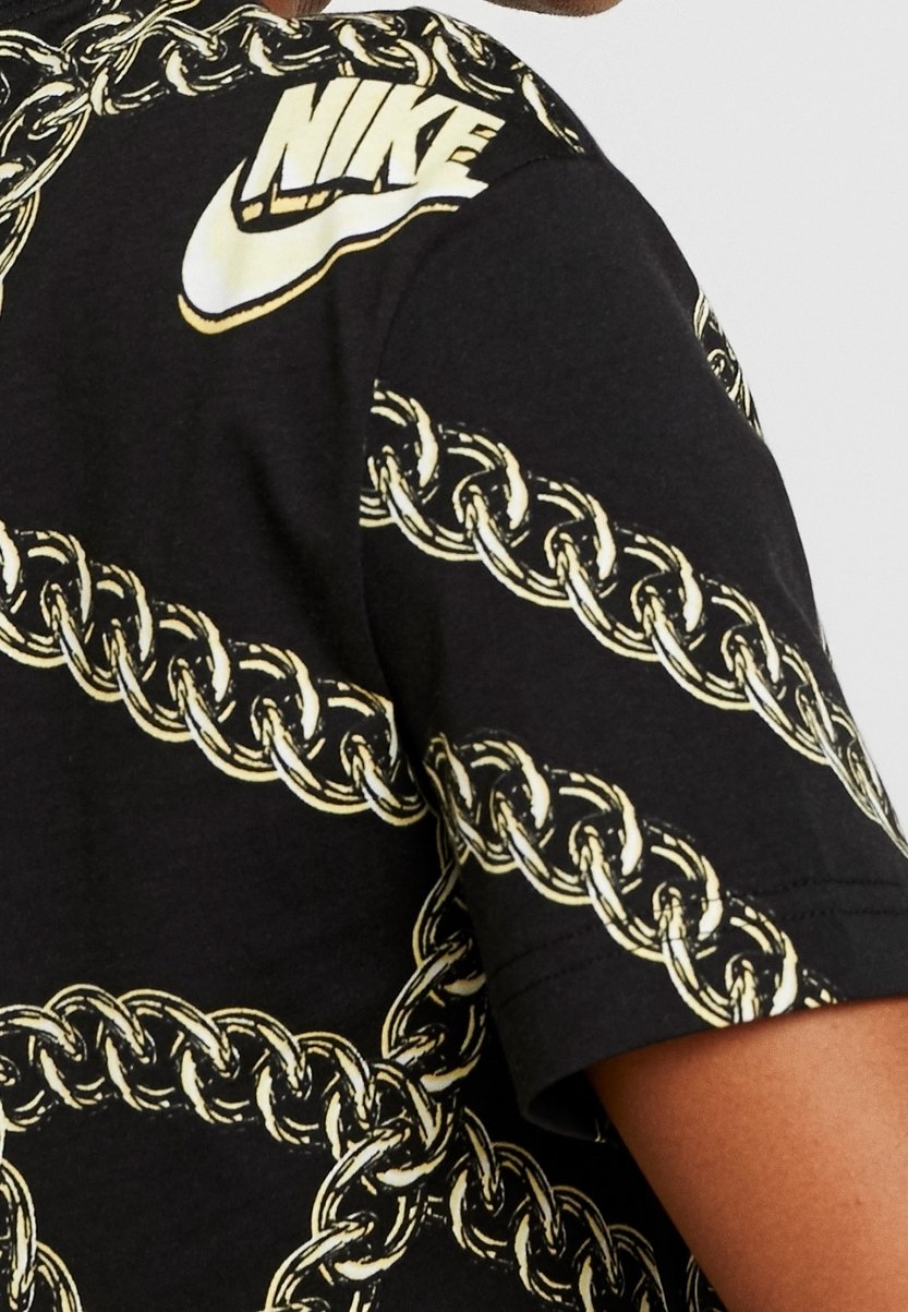 nike black and gold clothing