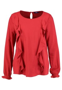 Blouse rouge à manches longues avec encolure ronde, détails à volants sur le devant, poignets élastiques et fermeture au dos par bouton avec ouverture en forme de goutte.