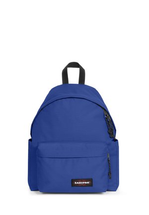 Blue fabric backpack with a rounded shape, front zip pocket, adjustable shoulder straps, and a top handle. Features Eastpak logo patch.