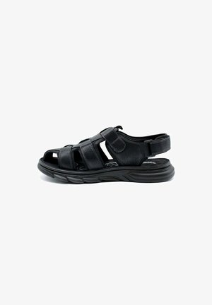 Sandal en cuir noir avec plusieurs sangles ajustables, design ouvert à l'avant, semelle rembourrée et talon arrondi pour plus de confort et de soutien.