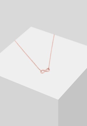 Rosen-gul halskæde med et uendelighedssymbol vedhæng. Kæden er delikat med en glat tekstur, der fremhæver vedhængets design.