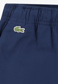 Lacoste STRETCH - Kalhoty - marine