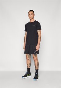 ASICS ROAD SHORT - Sports shorts - performance black
