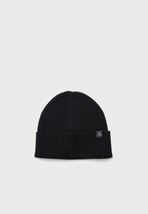 Black ribbed knit beanie with folded cuff and small black label featuring white "MOP" text on a plain background.