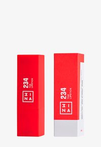 Red lipstick tube in a square design, featuring matte texture. Highlighted white label with "234 THE LIPSTICK" in bold graphic font.