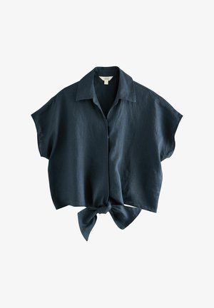 Majica s kratkimi rokavi iz temno modrega lanu s kragnjo in zavezanjem na dnu, ki se ponaša s sproščenim krojem in mehkobo.