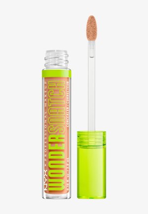 Geöffnete Tube des NYX Professional Makeup Wondershade Concealers mit grünem Deckel und beigem Applikatorstäbchen.