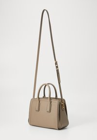 Tan leather handbag with a structured design, dual top handles, and a detachable shoulder strap. Features braided accents and gold hardware.