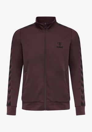 Maroon jacket with high collar, full zip, featuring black chevron patterns on sleeves and a small black logo on the chest. Smooth texture.
