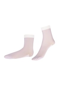 Helle beige Socken mit einem weißen Bündchen zeigen eine glatte, halbtransparente Textur und einen verstärkten Zehenbereich.