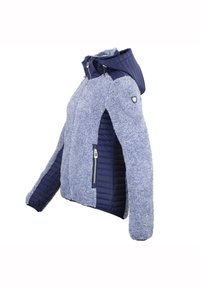 Blauwe jas met een fuzzy textuur aan de voorkant en gladde gevoerde mouwen. Heeft een capuchon en ritszakken voor functionaliteit.