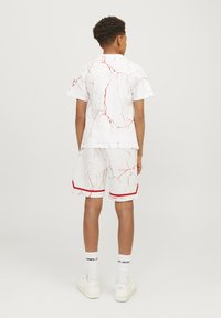 Jack & Jones Performance JJKEY SPORTY RELAXED  - Treningo apatinė dalis - white