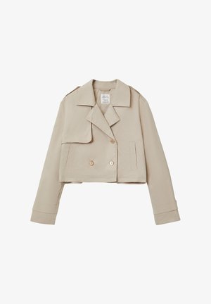 Giacca beige ritagliata con design a doppio petto, grande colletto, tasca con patta e chiusure con bottoni. Realizzata in un tessuto liscio e leggero.