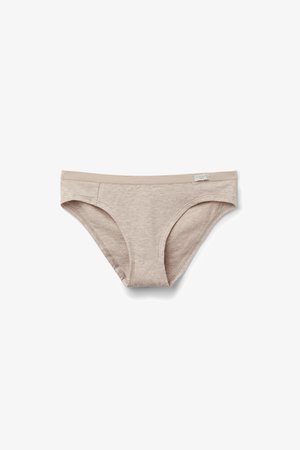 Culotte bikini beige pour femme en coton, avec ceinture élastique et petite étiquette de marque sur le côté droit.