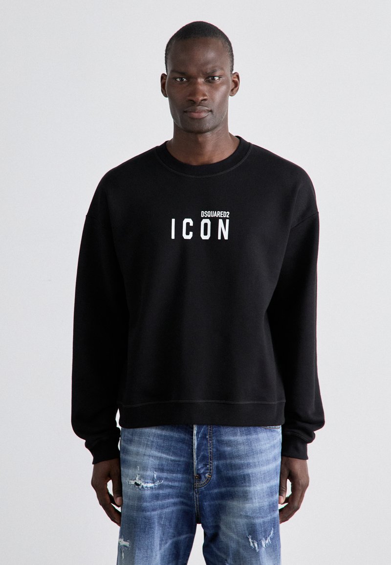 Must värvi puuvillane sviiter, millel on ümar kaelus ja soonikud, ning mille rinnal on valgete tähtedega trükitud "DSQUARED2 ICON".