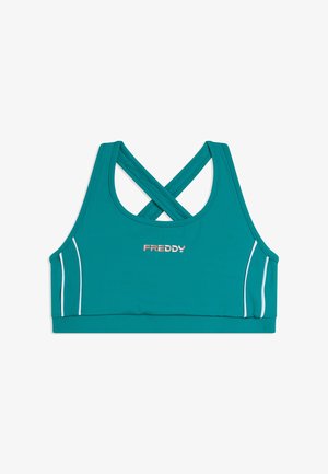 Reggiseno sportivo turchese con spalline incrociate sul retro, strisce verticali bianche ai lati e logo "FREDDY" in argento al centro davanti.