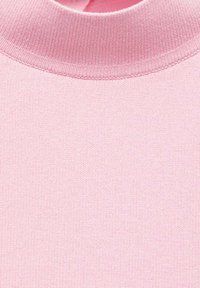 Light pink knit fabric with a smooth texture, featuring a ribbed crew neckline and consistent, fine pattern throughout.