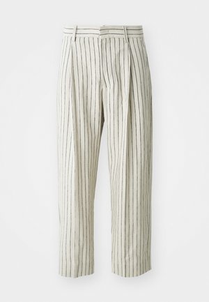 White striped trousers made of light fabric, featuring a relaxed fit, pleats, and a waistband with belt loops. Vertical navy stripes.