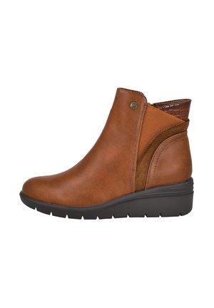 Botas de tobillo marrones con parte superior de cuero suave, parte trasera con textura en relieve de cocodrilo y suela de cuña de goma negra. Cierre de cremallera en el lateral.
