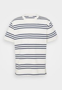 Cotton t-shirt with navy blue horizontal stripes on a cream background. Features a crew neckline and short sleeves.