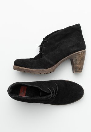 Rieker Plateaustøvletter - black