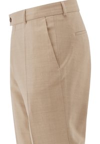 Beige tailored trousers featuring a smooth texture, front pleats, a tapered leg, and a back pocket with a button closure.
