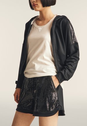 CON PAILLETTES - Short de sport - black