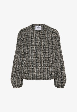 Juodas ir baltas tekstūruotas megztinis su pūstomis rankovėmis ir trumpu dizainu. Yra audimo raštas ir etiketė kaklo srityje.