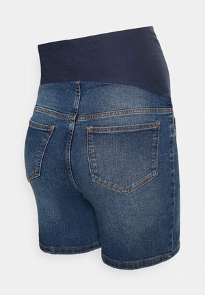 Denim graviditetsshorts med elastisk marineblå taljebånd og to baglommer, vist fra en bagfra side vinkel.