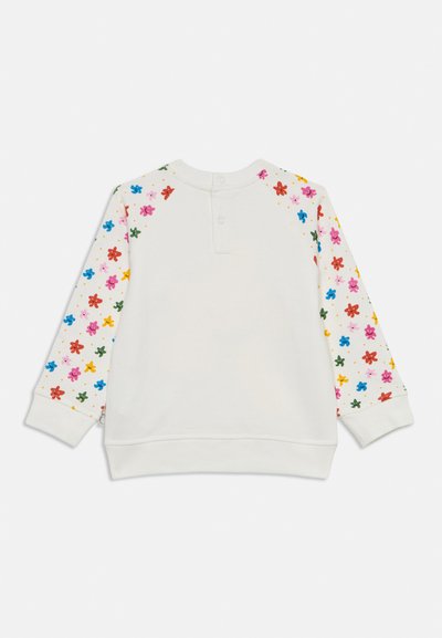 White sweatshirt featuring colorful flower patterns on sleeves, rounded neckline, and a button closure at the back. Soft, textured fabric.