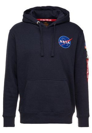 Sweatshirt bleu marine avec capuche, poche avant, logo de la NASA et patch du drapeau américain. Comprend des cordons de serrage et une poche zippée sur le côté.
