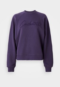 Purple sweatshirt with a round neckline and raglan sleeves. It features embroidered "Carhartt" logo in matching color. Soft fabric texture.