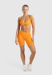 Smilodox EDINA SEAMLESS SCRUNCH - Tights - orange