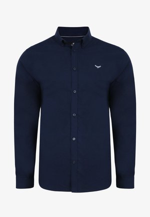 Marineblauwe overhemd met lange mouwen en knopen, voorzien van een klassieke kraag, met een klein logo op de linkerborst en een gladde stofstructuur.